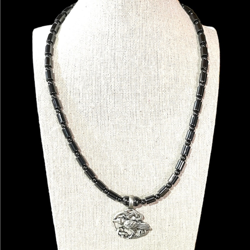 Raven Pendant with Celtic Design on Necklace of Black Hematite Beads (19” long)
